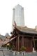 China: The modern Sheraton Hotel looms over Ming-era Buddhist Qianming Temple, Guiyang, Guizhou Province