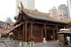China: Modern buildings loom over Ming-era Buddhist Qianming Temple, Guiyang, Guizhou Province